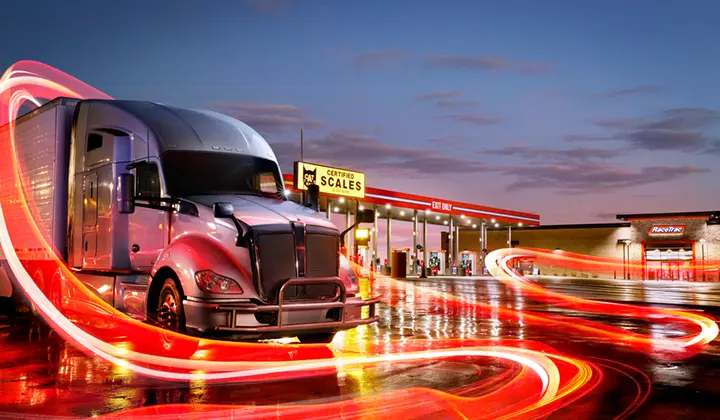 Semi truck in front of RaceTrac travel center