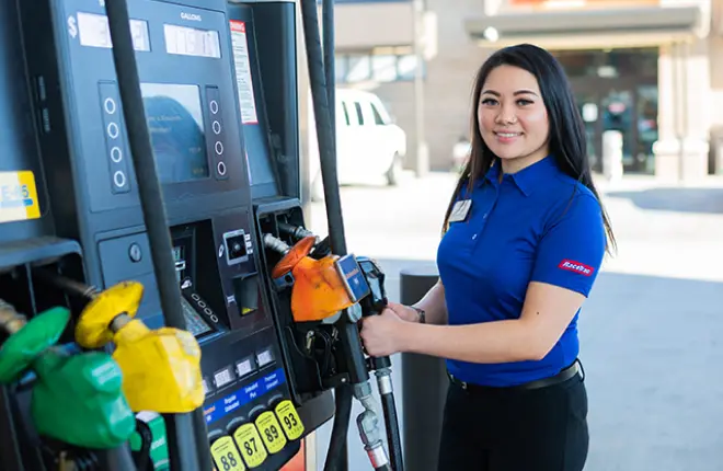 RaceTrac store associate at the gas pump