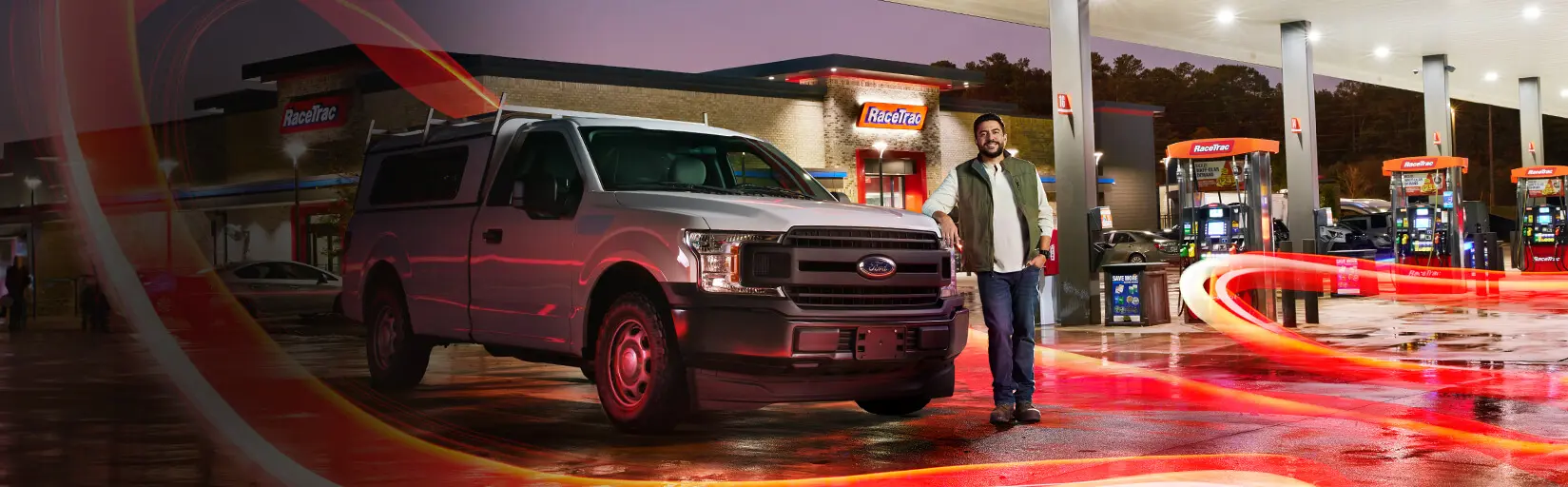 Fleet driver in front of pick up truck
