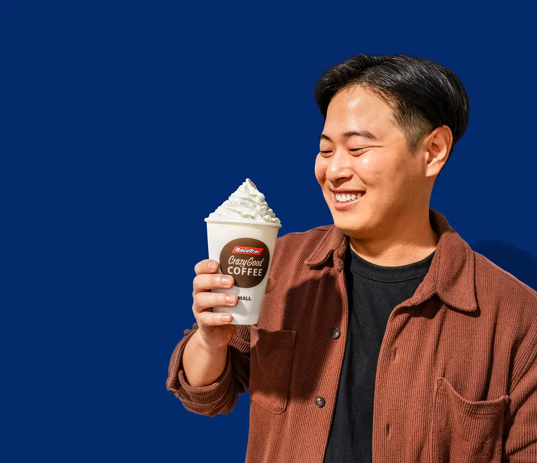 Man holding a Crazy Good Coffee from RaceTrac