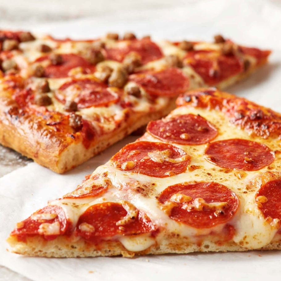  hot Pepperoni and Sausage pizza slices