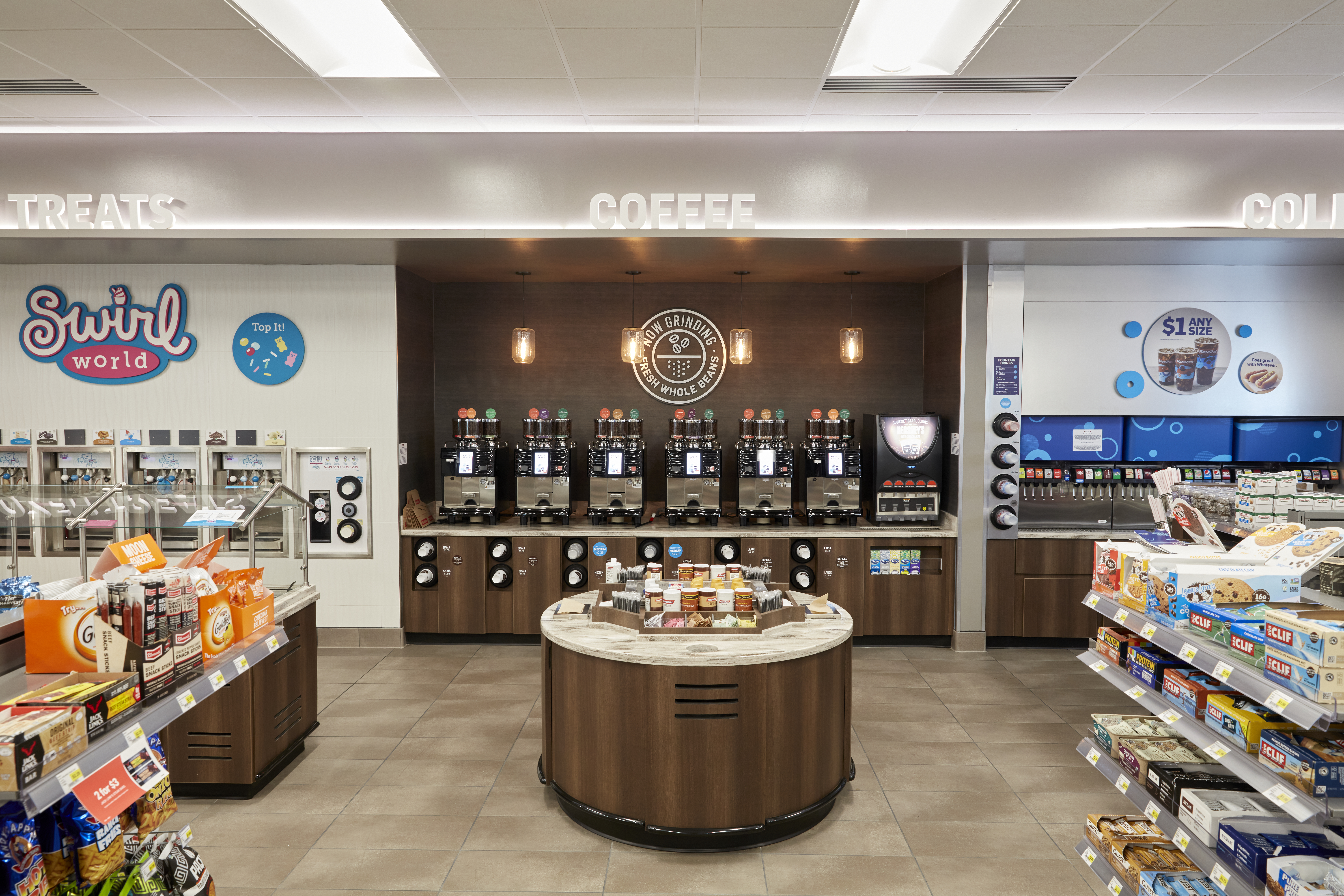 RaceTrac interior featuring swirl world, a coffee bar, and a fountain drink wall.