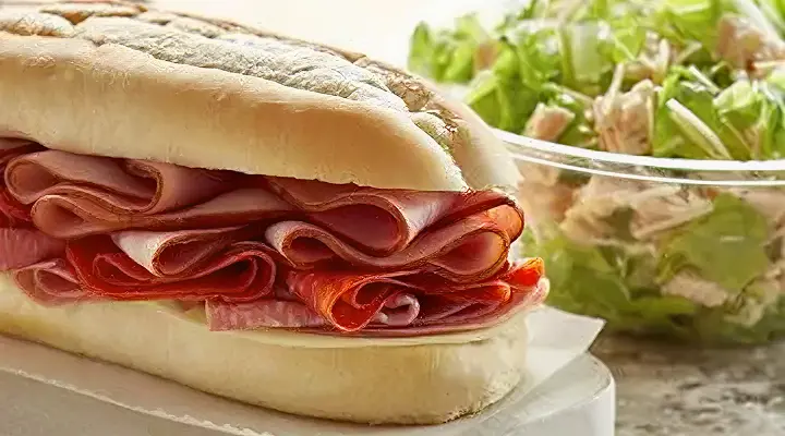 Ham sandwich and  a salad