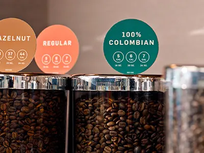 Colombian coffee beans above a coffee machine