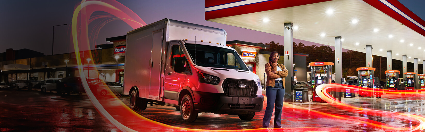 Box car with pro diver in front of a RaceTrac.